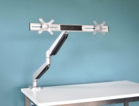 <h4>Vergroot de werkruimte met de DESQ flat screen monitorarmen.</h4>
<p>DESQ flat screen monitorarmen zijn een waardevolle ergonomische aanpassing voor monitors op alle werkplekken. Het gebruik van een monitorarm draagt bij aan een correcte werkhouding en creëert extra waardevolle ruimte op het bureau.</p>
<p>Deze dubbele monitorarm stelt de gebruiker in staat het beeldscherm in portret of landschap stand te zetten en hebben geïntegreerde kabelgeleiders voor een geordend bureau.</p>
<p><br /><strong style="color: #61993b;">✓ </strong></p>
<ul style="list-style-type: none;">
<ul style="list-style-type: none;">2 onafhankelijk instelbare armen</ul>
</ul>
<p><br /><strong style="color: #61993b;">✓ </strong></p>
<ul style="list-style-type: none;">
<ul style="list-style-type: none;">Arm met gasveer met één vinger te verstellen</ul>
</ul>
<p><br /><strong style="color: #61993b;">✓ </strong></p>
<ul style="list-style-type: none;">
<ul style="list-style-type: none;">Weerstand van de veer in te stellen voor verschillende beeldscherm gewichten</ul>
</ul>
<p><br /><strong style="color: #61993b;">✓ </strong></p>
<ul style="list-style-type: none;">
<ul style="list-style-type: none;">Inclusief tafelklembevestiging (tot 120 mm) en montageset bladdoorvoer</ul>
</ul>
<p><br /><strong style="color: #61993b;">✓ </strong></p>
<ul style="list-style-type: none;">
<ul style="list-style-type: none;">Speciaal ontwerp voor kabelmanagement</ul>
</ul>
<p><br /><strong style="color: #61993b;">✓ </strong></p>
<ul style="list-style-type: none;">
<ul style="list-style-type: none;">Met USB-aansluiting, waardoor eenvoudig bijvoorbeeld de telefoon of USB stick op de pc kan worden aangesloten</ul>
</ul>
<p><br /><strong style="color: #61993b;">✓ </strong></p>
<ul style="list-style-type: none;">
<ul style="list-style-type: none;">Voorzien van 3,5 mm jack voor microfoon en luidspreker. Ideaal voor het gebruik van een headset</ul>
</ul>
<p> </p>